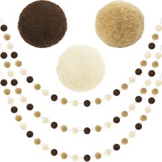 three different types of pom - poms are arranged in the shape of a smiley face