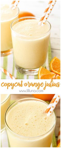 two glasses filled with orange juice on top of a table next to an orange slice