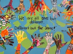 there are many different handprints on the blue background with words that say, we are all one but different but the same