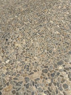 an umbrella sitting on top of a stone floor