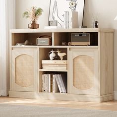 an entertainment center with speakers and books on it