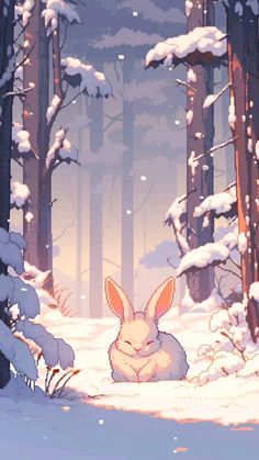 a rabbit sitting in the middle of a snowy forest