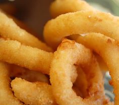 some onion rings are sitting on a table