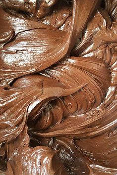 close up view of chocolate icing that has been swirled