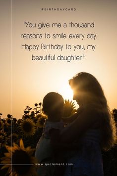 a mother and daughter hugging each other with the sun in the background