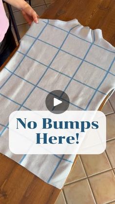 a woman is cutting fabric on top of a table with the words no bumps here