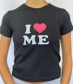 "I ♥ ME baby tee 100% cotton available in sizes xs - xl - see photo 3 for sizing Model is wearing size S and is a 6/8 - For reference, model is 5'5 with 31\" bust and 26\" waist baby tee with i love / heart me embroidery" Cute Fitted T-shirt With Heart Graphic, Fitted Basic T-shirt With Slogan, Fitted Cotton Cropped T-shirt With Graphic Print, Fitted Casual T-shirt With Heart Graphic, Fitted Cotton Tops With Text Print, Cute Stretch Cotton T-shirt, Fitted Cotton Slogan Top, Stretch Short Sleeve Tops With Heart Graphic, Stretch Top With Heart Graphic And Short Sleeves