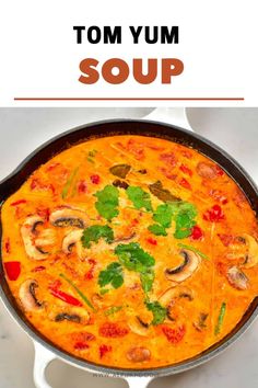 an image of tom yum soup in a skillet with the title above it