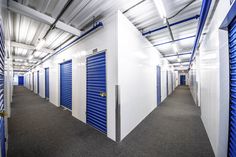 a row of blue and white storage units