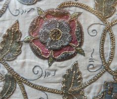 An embroidered Tudor rose on display at Petworth House, Sussex.  Associated with Queen Elizabeth’s favourite, Robert Dudley, Earl of Leicester Embroidered Caskets, Quilted Petticoat, Petworth House, English Culture, Embroidery Roses, Robert Dudley, English Embroidery, Medieval Embroidery, History Queen