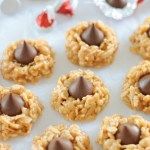 cookies with chocolate in the middle on a baking sheet