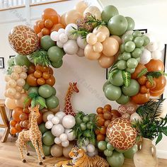 a wreath made out of balloons and giraffes