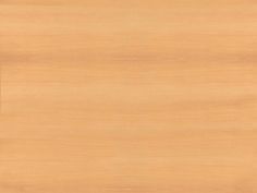 a close up view of a wood grain textured background or wallpaper with light brown tones