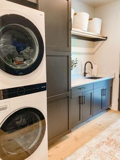 a washer and dryer in a small room