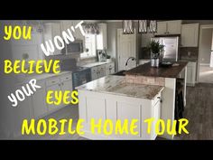 an open kitchen and living room with the words upgrades everywhere mobile home tour on it