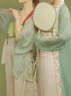 A popular summer outfit from the Song Dynasty, modernized for today's traditional fashion lovers! The Bai Tao 白桃 White Peach Set features classic 13th century summerwear pieces, combined with a lighter and contemporary print. The star of the show is most definitely the Song Ku 宋裤 (Song Dynasty trousers), consisting of a patterned base pant and a sheer open side trouser. This creates an ethereal and dimensional pant style, perfect for any occasion! Mix and match different trousers with the sheer Vintage Sets For Spring Daywear, Vintage Summer Daywear Sets, Traditional Kimono For Spring Tea Ceremony, Traditional Green Kimono For Summer, Traditional Green Kimono For Spring, Northern Wei Dynasty Clothing, Traditional Green Summer Kimono, Traditional Spring Kimono, Hanfu Han Dynasty