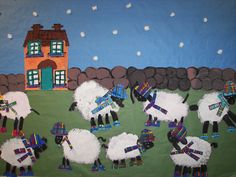 a painting of sheep in front of a house