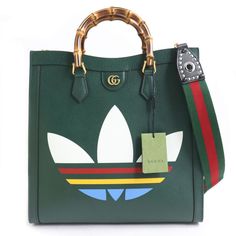 Gucci X Adidas Diana Large Tote Bag Dark Green Height: About 38 Cm Width: About 37 Cm Depth: About 15 Cm Gucci Shoulder Bag With Logo, Designer Bags With Bamboo Double Handle, Modern Gucci Shoulder Bag With Logo, Designer Green Shoulder Bag With Handles, Designer Bags With Logo For Daily Use, Designer Rectangular Shoulder Bag With Logo, Designer Handheld Bags With Bamboo Handle, Designer Tote Bag With Logo, Green Gucci Travel Bag