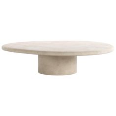 an oval table with a white marble top and round base, on a white background