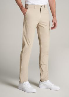 About Our Men's Tall Pants These extra-long chinos strike the perfect balance between classic and comfortable. They're designed to look like a pair of tapered chinos but are made of a lighter stretchy fabric that provides plenty of room for movement so you can tee off on the golf course, take the dog for a walk or grab dinner with friends at that new restaurant in town. We know how hard it is to find men's tall pants, which is why we made sure this pair had an extra-long inseam measured specific Cream Khaki Pants Outfit Men, Chinos Pants For Men, Men’s Chinos, Beige Chinos Men Outfits, Classic Pants For Men, Formal Chinos, Khaki Pants For Men, Light Khaki Pants, Men Chinos