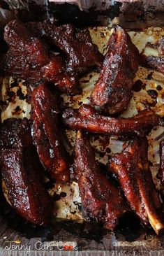 barbecued ribs and onions in a foil container