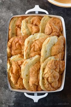 a casserole dish filled with sliced bread