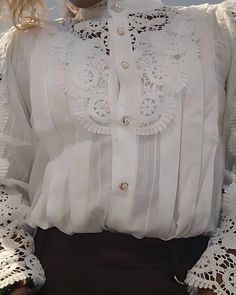 Step into timeless elegance with our Lace-Up Floral Blouse, a versatile piece that seamlessly blends vintage charm with modern flair. Crafted from delicate cotton lace, this blouse features intricate floral embroidery, exuding sophistication and grace. 🌸 Elevate Your Style 🌸 The lace-up top adds a touch of allure, while the floral embroidery enhances its feminine appeal. Whether you're attending a wedding or a work event, this blouse is sure to turn heads. 🌿 Features and Details 🌿 Fabric: So Women Lace Blouse, Victorian Blouse, White Cotton Blouse, Womens Tops Dressy, Clothing Board, Blouse For Women, Dressy Tops, Cotton Blouse, Womens Blouses