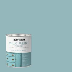 a blue paint can with the words rustfolemm milk paint in white on it