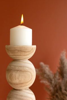 Give these neutral candle holders a roll. These holders, which look like stacked wooden balls, are the perfect neutral touch for your table, mantle, or bookshelf. They suit any style of decor and make a great gift. *Candles not included Large: 5.5"d x 16.5"t Small: 5.5"d x 12.5"t Hand Carved Candles, Ball Candles, Candle Carving, Wood Candle, Wood Candle Holders, Led Candle, Wood Candles, Candle Holder Set, Beautiful Candles