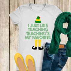 a t - shirt that says i just like teaching teachers my favorite with some shoes and scarf