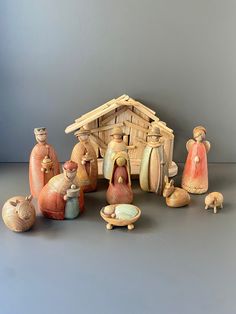 an assortment of nativity figurines including a baby jesus