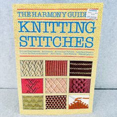 the harmony guide to knitting stitches book on a white surface with many different patterns and colors