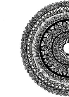 a black and white drawing of a circular object with an intricate design in the center