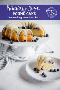 a bundt cake with blueberries and icing sitting on a plate next to another bundt cake