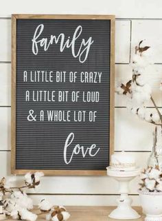 a black and white sign that says family, a little bit of crazy a little bit of cloud and a whole lot of love