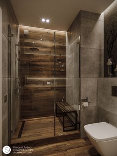 a bathroom with a toilet, shower and wooden flooring is shown in this image