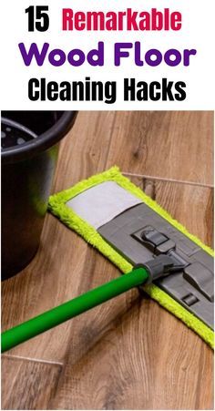 a mop and cleaning cloth on the floor with text overlay that reads 15 remarkable wood floor cleaning hacks