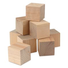 several wooden blocks stacked on top of each other