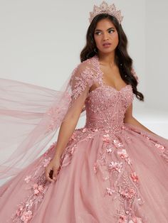 Captivate the room in this 3D floral applique long strapless cape dress with A-line skirt by House of Wu 26057. Regal quinceañera ball gown features a sweetheart neckline and a bodice featuring allover three-dimensional floral lace appliqué that cascades down the voluminous ball gown sparkle tulle overskirt. Play with detachable sleeves for a strapless look, and a matching cape. Lace-up back closure and royal train. The removable bell sleeves and cape are included - giving you a versatile look! Quinceanera Ball Gown With Floral Applique For Prom Season, Floral Applique Ball Gown For Quinceanera Or Prom, Floral Applique Ball Gown Quinceanera Dress For Prom Season, Elegant Quinceanera Dress With Floral Applique For Debutante Ball, Floral Applique Quinceanera Dress For Prom, Sweetheart Neckline Gown With Floral Applique For Debutante Ball, Floral Applique Gown With Sweetheart Neckline For Debutante Ball, Ball Gown Sparkle, Royal Blue Ball Gown