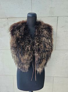 Fin raccoon fur vest full pelt skin devided in two and unit with nappa lamb part and strings, offers a viking  way style. one size fits the most. Length 40cm. no lining  We ship worldwide with registered mail. Europe: DHL road estimated delivery time by one week. USa, Canada, Australia and most of Asia public post estimated delivery time 8-21 days except the xmas period which takes a little bit longer due to huge post traffic. Disclaimer: We use fur from farmed animals based in Finland. Short Vest, Vest Outfits, Fur Vest, Natural Brown, Larp, Vikings, Clothes For Women