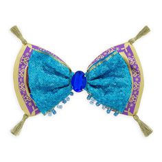 a blue and purple bra with tassels on it