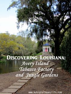 a path leading to a small house on the side of a river with text describing discovering louisiana avery island - abaso factory and jungle gardens