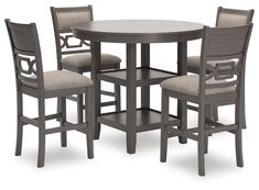 a table with four chairs around it and one chair at the base is upholstered