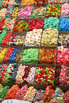 there are many different types of candies on display