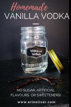 vanilla vodka in a glass jar with cinnamon sticks