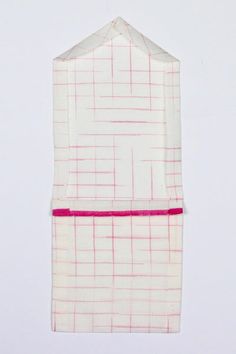 a piece of cloth with pink lines on it