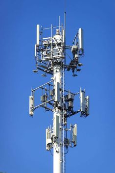 a cell phone tower with multiple cellular towers