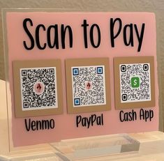 a pink sign that says scan to pay, venmo, paypai and cash app