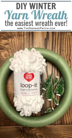 a green wreath with white frosting and shamrocks on it that says, diy winter yarn wreath the easyest wreath ever