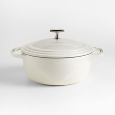 a white casserole dish with a lid